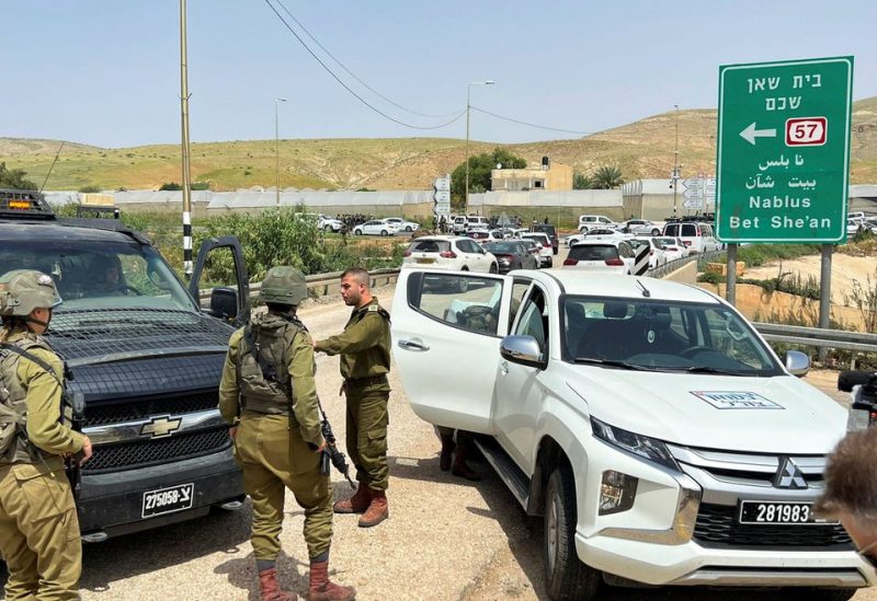 Israeli troops stand guard at a shooting attack scene, in the Jordan Valley in the Israeli-occupied West Bank April 7, 2023. REUTERS