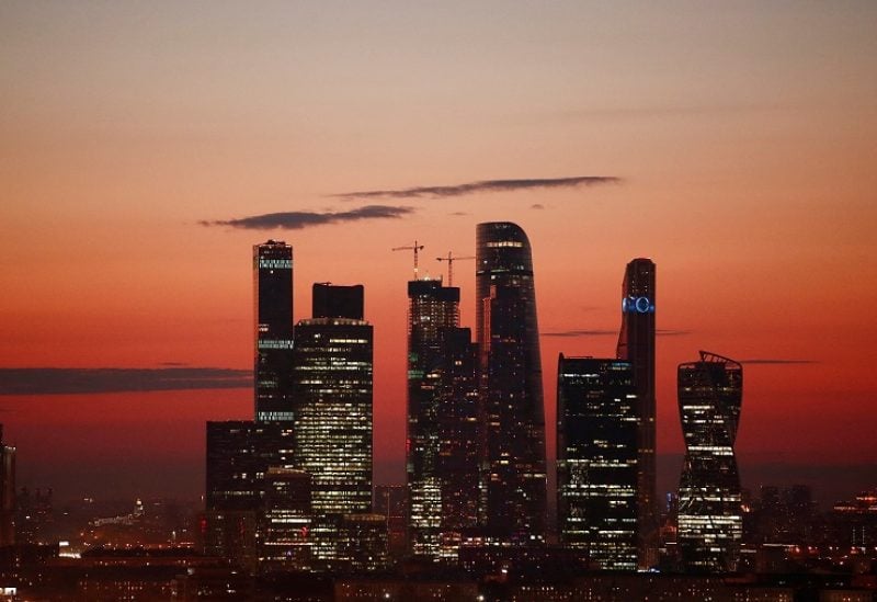FILE PHOTO: The skyscrapers of the Moscow International Business Centre, also known as "Moskva-City", are seen just after sunset in Moscow, Russia July 12, 2018. Picture taken July 12, 2018. REUTERS/Christian Hartmann/File Photo