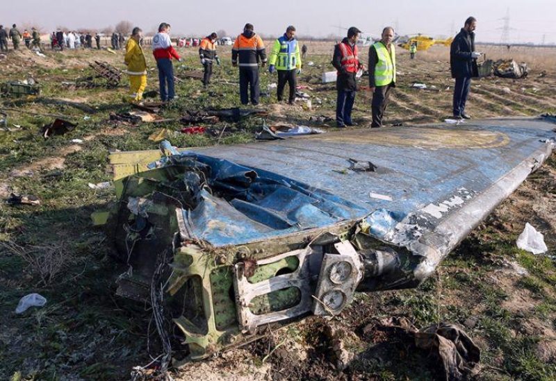 Rescue teams are seen on January 8, 2020 at the scene of a Ukrainian airliner that crashed shortly after takeoff near Imam Khomeini airport in Tehran, Iran [File: Akbar Tavakoli/ IRNA/AFP]