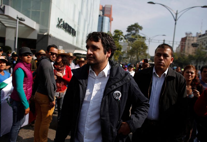 Andres Manuel Lopez Beltran, the son of leftist leader Andres Manuel Lopez Obrador, arrives to a protest against an energy reform bill at the Senate building in Mexico City December 4, 2013. REUTERS/Tomas Bravo/File Photo