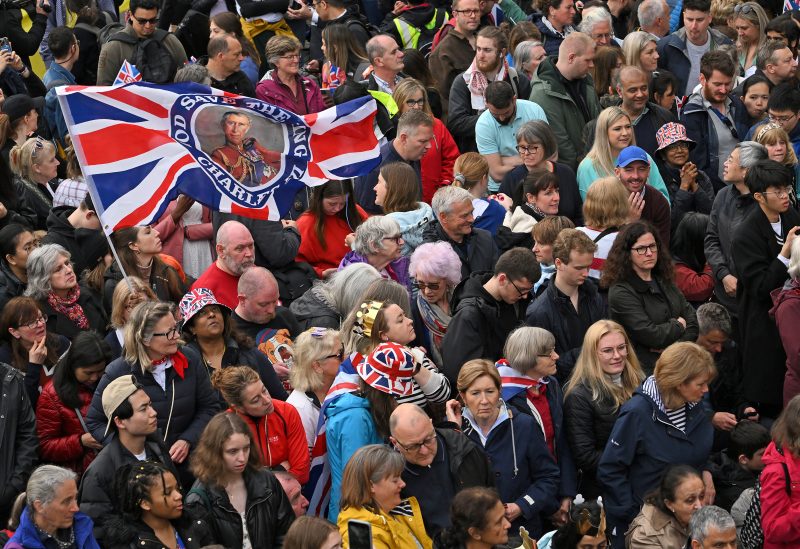 Well-wishers line the route of the 'King's Procession', a two kilometres stretch from Buckingham Palace to Westminster Abbey, in central London, on May 6, 2023 ahead of the Coronation of King Charles III. SEBASTIEN BOZON/Pool via REUTERS