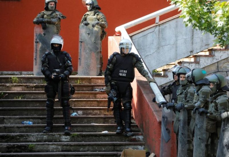 Polish Kosovo Force (KFOR) soldiers stand guard at a municipal office in Zvecan, Kosovo May 30, 2023. REUTERS