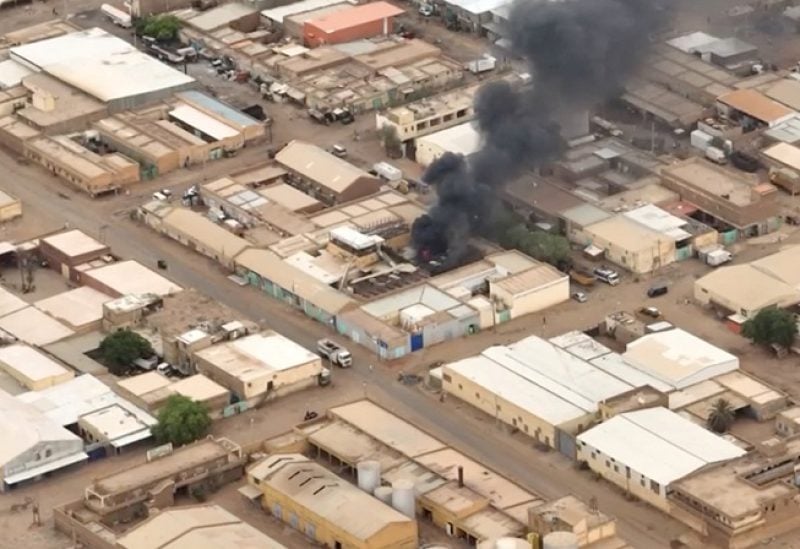 A view shows a fire at the industrial area given as Omdurman, Sudan, April 30, 2023, in this still image taken from video obtained by Reuters. Video obtained by Reuters/via REUTERS THIS IMAGE HAS BEEN SUPPLIED BY A THIRD PARTY. REUTERS WAS NOT ABLE TO INDEPENDENTLY VERIFY THE LOCATION OF THIS VIDEO.