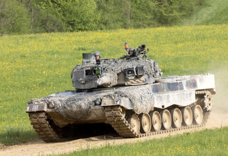 Recruits of the Swiss army Tank School 21 perform an attack exercise with the Leopard 2 tank in Bure, Switzerland May 5, 2023. REUTERS