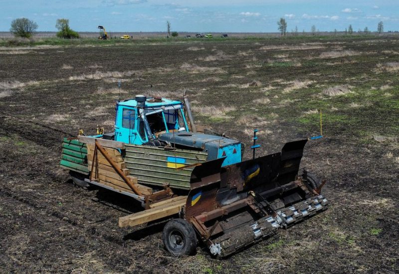 A remote controlled demining machine, created by local farmer Oleksandr Kryvtsov with his tractor and armoured plates from destroyed Russian military vehicles