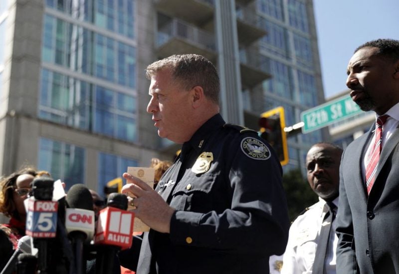Atlanta Police Chief Darin Schierbaum delivers remarks next to Atlanta Mayor Andre Dickens as they attend a press conference after reports of several casualties from a gunman in a downtown hospital in Atlanta, Georgia, May 3, 2023 - REUTERS