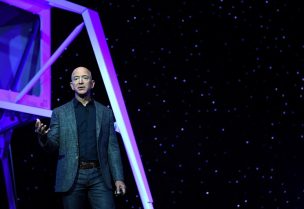 FILE PHOTO: Founder, Chairman, CEO and President of Amazon Jeff Bezos unveils his space company Blue Origin's space exploration lunar lander rocket called Blue Moon during an unveiling event in Washington, U.S., May 9, 2019. REUTERS/Clodagh Kilcoyne/File Photo