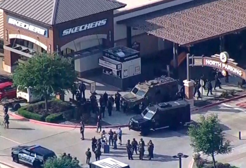 Police respond to a shooting in the Dallas area's Allen Premium Outlets, which authorities said has left multiple people injured in Allen, Texas, U.S. May 6, 2023