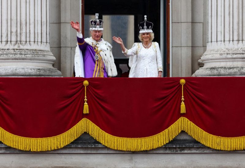 Britain's King Charles and Queen Camilla wave on the Buckingham Palace balcony following their coronation ceremony in London, Britain May 6, 2023. REUTERS