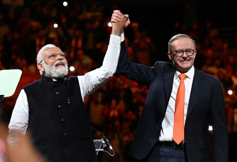 India's Prime Minister Narendra Modi and Australia's Prime Minister Anthony Albanese attend a community event at Qudos Bank Arena in Sydney, Australia May 23, 2023. AAP Image/Dean Lewins via REUTERS ATTENTION EDITORS - THIS IMAGE WAS PROVIDED BY A THIRD PARTY. NO RESALES. NO ARCHIVE. AUSTRALIA OUT. NEW ZEALAND OUT.