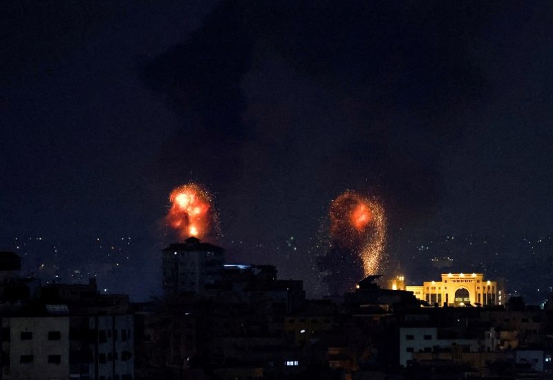 Explosions light up the sky after the Israeli military said in a statement that it has struck Islamic Jihad targets, in Gaza, May 9, 2023. REUTERS/Mohammed Salem TPX IMAGES OF THE DAY