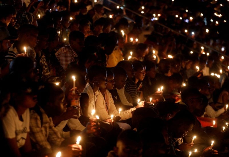 FILE PHOTO: Participants hold candles while holding a night vigil during a commemoration ceremony marking the 25th anniversary of the Rwandan genocide, at the Amahoro stadium in Kigali, Rwanda April 7, 2019. REUTERS/Baz Ratner/File Photo
