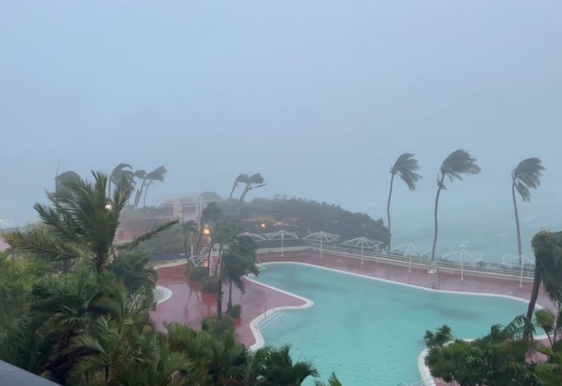 Trees sway due to strong winds from typhoon Mawar, in Tamuning, Guam, May 24, 2023, in this screen grab obtained from social media. M.F. Peoples/via REUTERS