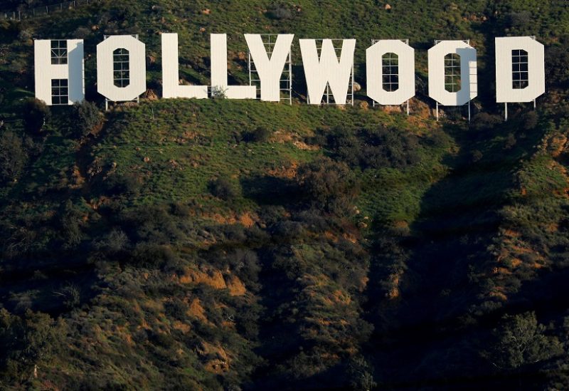 FILE PHOTO: The iconic Hollywood sign is shown on a hillside above a neighborhood in Los Angeles California, U.S., February 1, 2019. REUTERS/Mike Blake/File Photo