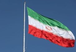 The Iranian flag is seen flying over a street in Tehran, Iran, February 3, 2023 - REUTERS