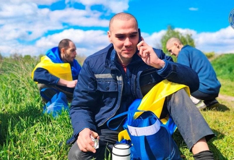 A Ukrainian prisoner of war (POW) speaks with relatives via mobile phone after a swap, amid Russia's attack on Ukraine, at an unknown location in Ukraine, in this handout picture released May 6, 2023. Coordination Headquarters for the Treatment of Prisoners of War/Handout via REUTERS ATTENTION EDITORS - THIS IMAGE HAS BEEN SUPPLIED BY A THIRD PARTY. MANDATORY CREDIT.