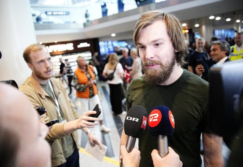 Danish citizen Thomas Kjems speaks to journalists after arriving at Copenhagen Airport, in Copenhagen, Denmark June 3, 2023 after being released from detention in Iran. Thomas Kjems and two other Europeans were released from detention by Iran in the latest in a series of prisoner swaps. Ritzau Scanpix/Martin Sylvest via REUTERS