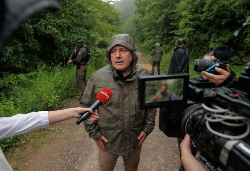 Kosovo's Interior Minister Xhelal Svecla talks to the media near the village of Bare, Kosovo, June 14, 2023. REUTERS