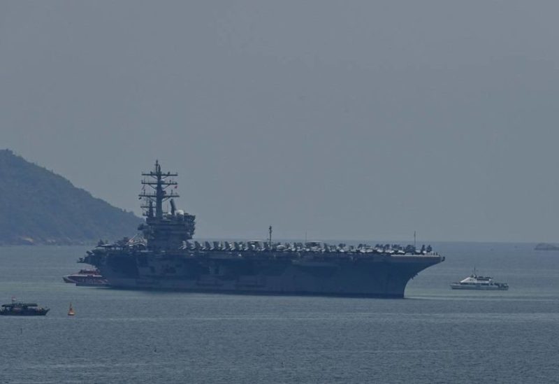 The USS Ronald Reagan, a US Navy Nimitz-class nuclear-powered aircraft carrier, pulls into port in Danang on June 25, 2023. (AFP)