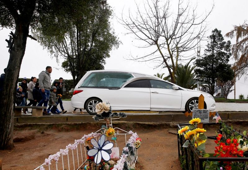 Jose Luis Parra and his wife Yesenia Sanchez attend the funeral of their two-month-old daughter Dana Parra Sanchez, who died due to an aggressive respiratory virus at the hospital, in Quilpue, Chile June 9, 2023. REUTERS/Rodrigo Garrido