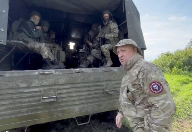 Founder of Wagner private mercenary group Yevgeny Prigozhin speaks with servicemen during withdrawal of his forces from Bakhmut