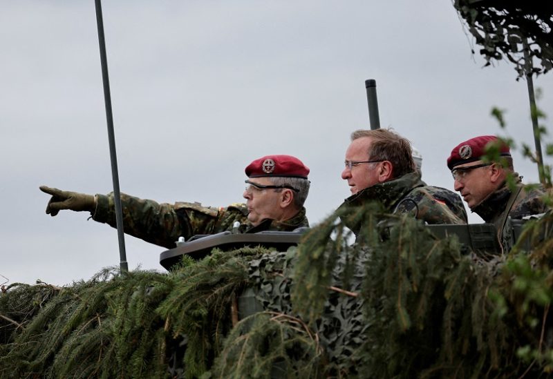 FILE PHOTO: German Defence Minister Boris Pistorius, flanked by German Lieutenant General and Chief of the German Army Alfons Mais, visits a training site of German army Bundeswehr in Hammelburg, Germany May 16, 2023. REUTERS/Heiko Becker/File Photo
