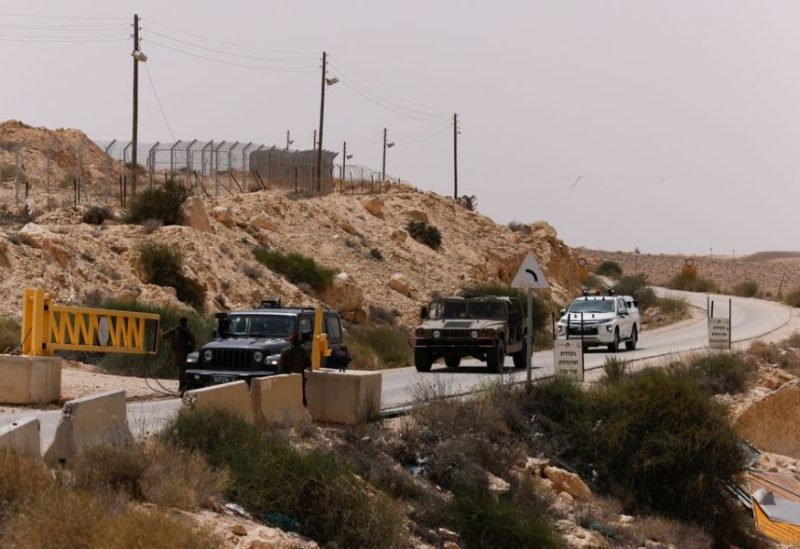 Vehicles approach the gate near the site of a reported security incident near Israel's southern border with Egypt, Israel June 3, 2023. REUTERS