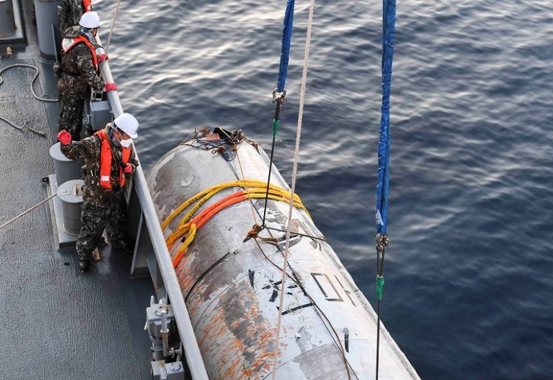 A handout picture shows a part of what is believed to be a space launch vehicle that North Korea said crashed into the sea off the west coast of the divided peninsula, and which the South Korean military had salvaged, at an unidentified location in South Korea, June 15, 2023. The Defense Ministry/Handout via REUTERS ATTENTION EDITORS - THIS IMAGE HAS BEEN SUPPLIED BY A THIRD PARTY. TPX IMAGES OF THE DAY