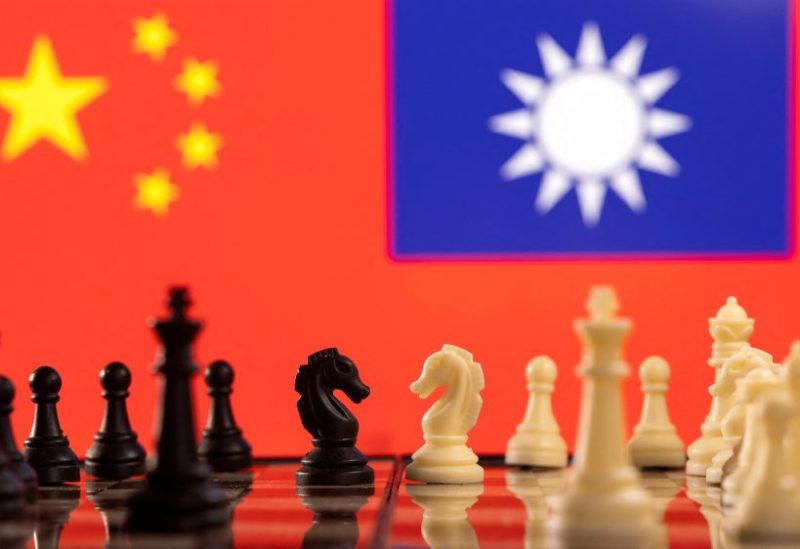 Chess pieces are seen in front of displayed China and Taiwan's flags in this illustration taken January 25, 2022. REUTERS/Dado Ruvic/Illustration/File Photo