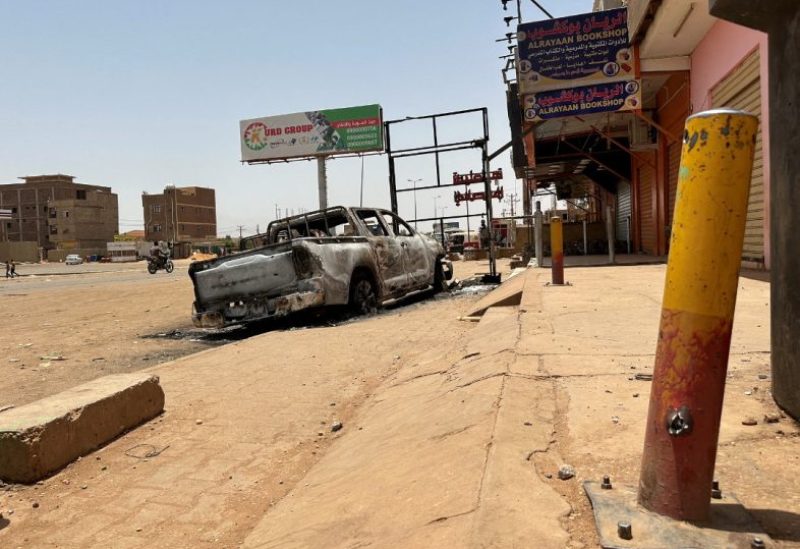 A view shows a destroyed vehicle as clashes between the army and the paramilitary Rapid Support Forces (RSF) continue, in Omdurman, Sudan July 4, 2023. REUTERS/Mostafa Saied