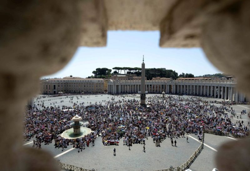 People gather to attend the Angelus prayer led by Pope Francis, at Saint Peter's Square, at the Vatican, July 9, 2023. Vatican Media/­Handout via REUTERS