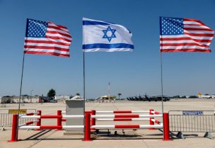 Israeli and American flags stand during the final rehearsal for the ceremony to welcome U.S. President Joe Biden ahead of his visit to Israel, at Ben Gurion International airport, in Lod near Tel Aviv, Israel July 12, 2022. REUTERS/Amir Cohen/File Photo