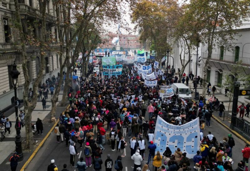 People gather near the presidential palace during a protest as inflation is hitting 114 per cent, hurting salaries and spending power, with many blaming tighter policies they say are due to the deal with the IMF, in Buenos Aires, Argentina June 16, 2023. REUTERS/Miguel Lo Bianco/File Photo