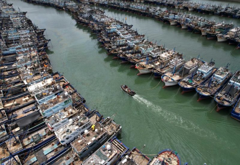 Fishing boats are seen moored at Gaoqi fishing port as typhoon Doksuri approaches, in Xiamen, Fujian province, China July 26, 2023. cnsphoto via REUTERS