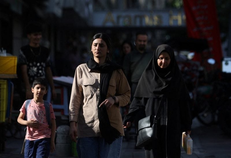 An Iranian woman walks on a street during the revival of morality police in Tehran, Iran, July 16, 2023. Majid Asgaripour/WANA (West Asia News Agency) via REUTERS ATTENTION EDITORS - THIS IMAGE HAS BEEN SUPPLIED BY A THIRD PARTY.