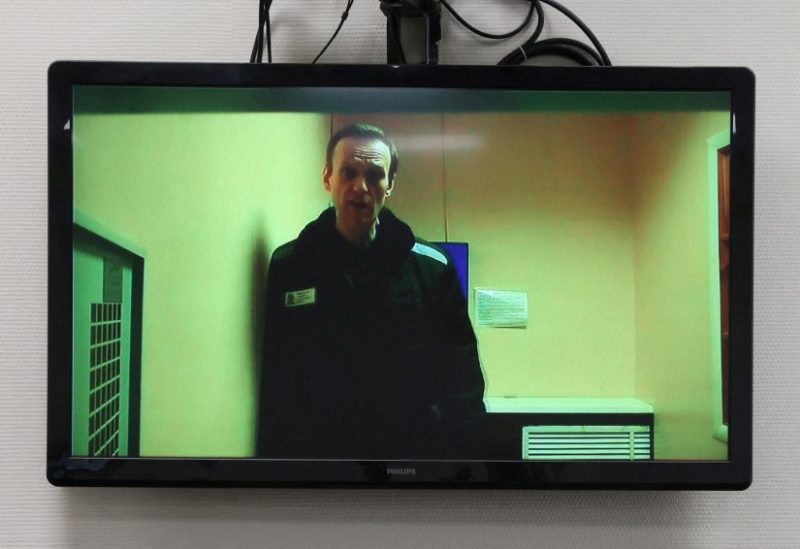 Russian opposition leader Alexei Navalny is seen on a screen via video link from a penal colony in the Vladimir Region during a hearing at the Basmanny district court in Moscow, Russia April 26, 2023. REUTERS/Yulia Morozova/File Photo