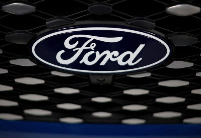 The Ford logo is seen on the grill of an E-transit concept vehicle at the Ford Halewood transmissions plant in Liverpool, Britain, December 1, 2022. REUTERS/Phil Noble/File Photo
