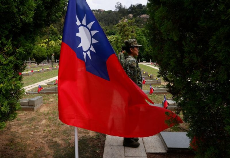 Soldiers stand guard at the grave sites of the fallen soldiers for a ceremony commemorating the 65th anniversary of the Second Taiwan Strait Crisis, in Kinmen, Taiwan August 23, 2023. REUTERS/Ann Wang