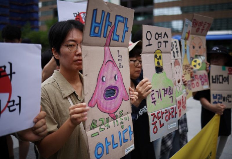 Activists attend a protest against Japan's plan to release treated wastewater from the Fukushima nuclear power plant into the ocean, at the national assembly in Seoul, South Korea, August 24, 2023. REUTERS/Kim Hong-Ji