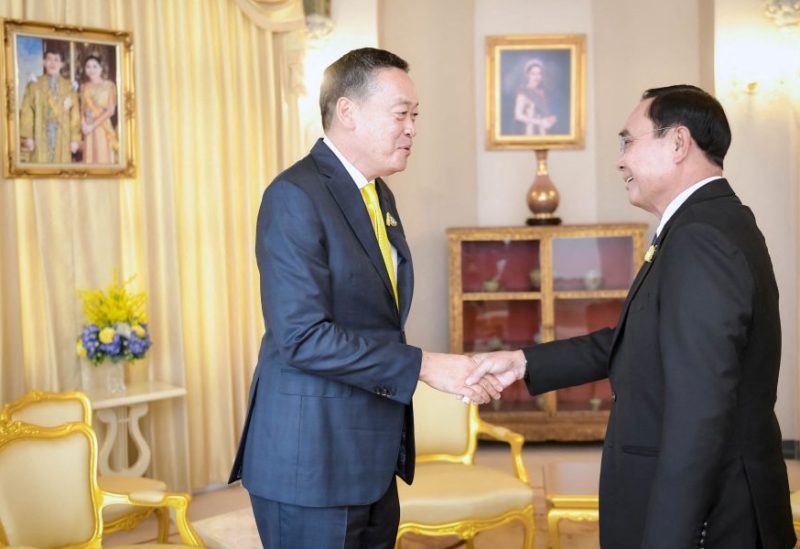 Thailand's new Prime Minister Srettha Thavisin meets with caretaker former Prime Minister Prayuth Chan-ocha at the government house in Bangkok, Thailand August 24, 2023. Government House/Handouts via REUTERS