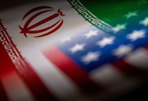 Iran's and U.S.' flags are seen printed on paper in this illustration taken January 27, 2022. REUTERS/Dado Ruvic/Illustration/File Photo Acquire Licensing Rights