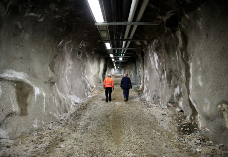 Security specialist Tapio Hietakangas walks with an employee in a tunnel of Santa Park near Rovaniemi, Finland, May 24, 2022. Picture taken May 24, 2022. REUTERS/Stoyan Nenov/File Photo