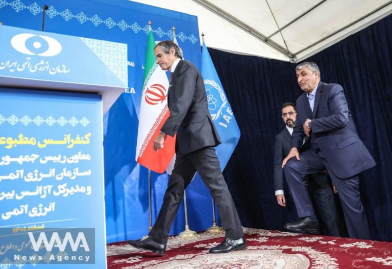Head of Iran’s Atomic Energy Organization Mohammad Eslami and International Atomic Energy Agency (IAEA) Director General Rafael Grossi arrive at a news conference, in Tehran, Iran, March 4, 2023. Majid Asgaripour/WANA (West Asia News Agency)
