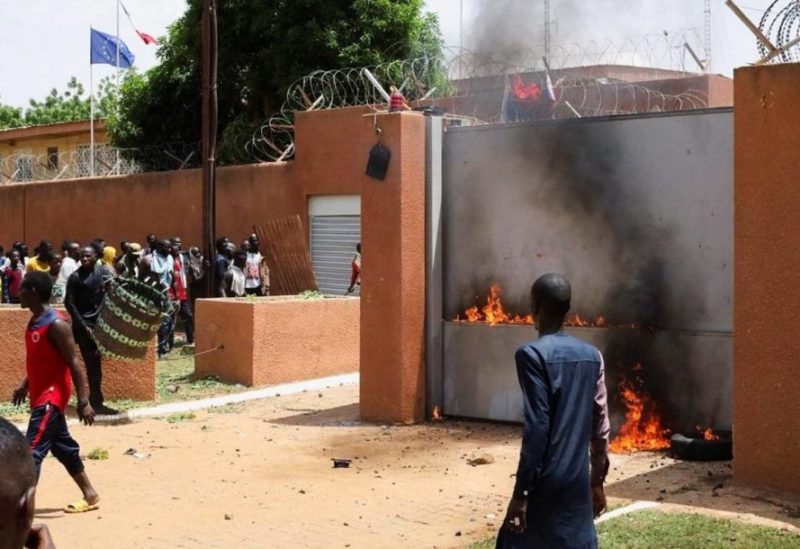 Pro-junta demonstrators gathered outside the French embassy, try to set it on fire before being dispersed by Nigerian security forces in Niamey, the capital city of Niger July 30, 2023. (Reuters)