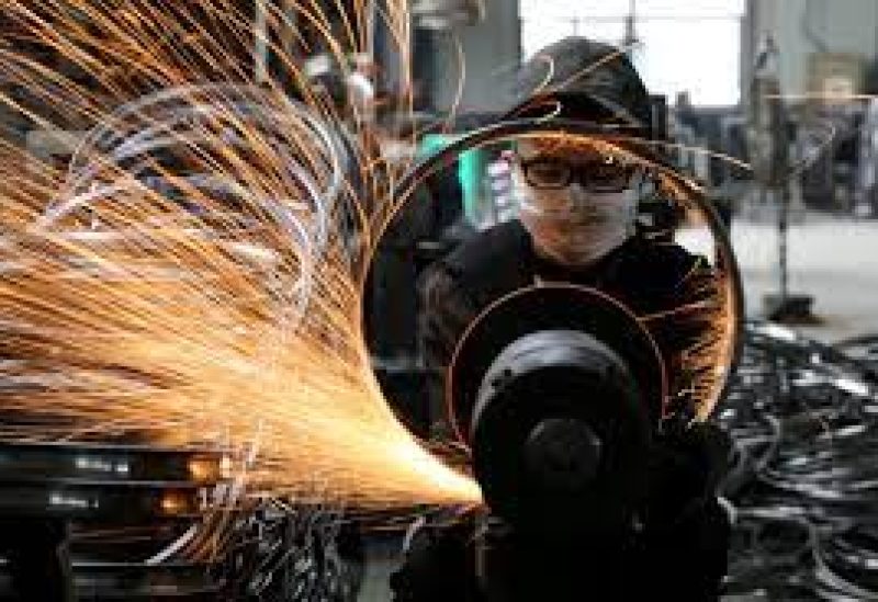 A worker welds a bicycle steel rim at a factory manufacturing sports equipment in Hangzhou, Zhejiang province, China September 2, 2019. China Daily via REUTERS/File Photo