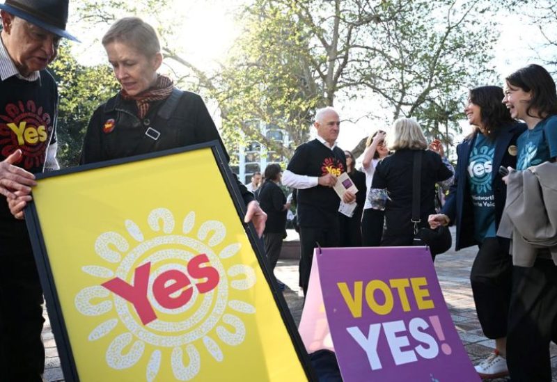 Former Prime Minister Malcolm Turnbull hands out Yes campaign material for the Voice in Kings Cross, Sydney, August 30, 2023. AAP Image/Dean Lewins via REUTERS