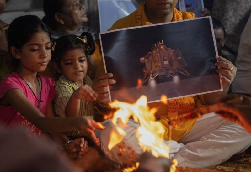 People perform "havan" (traditional Hindu fire ritual) as part of a special prayer for the safe landing of Chandrayaan-3 spacecraft on the moon, in New Delhi, India, August 23, 2023. REUTERS