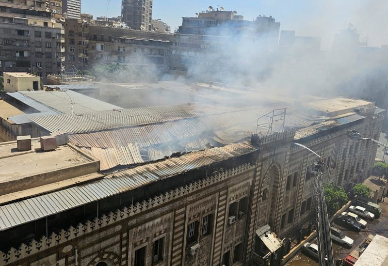 Smoke rises as Egyptian firefighters extinguish a fire that broke out in the historic neo-Islamic ministry in central Cairo, Egypt, August 5, 2023. REUTERS/Patrick Werr