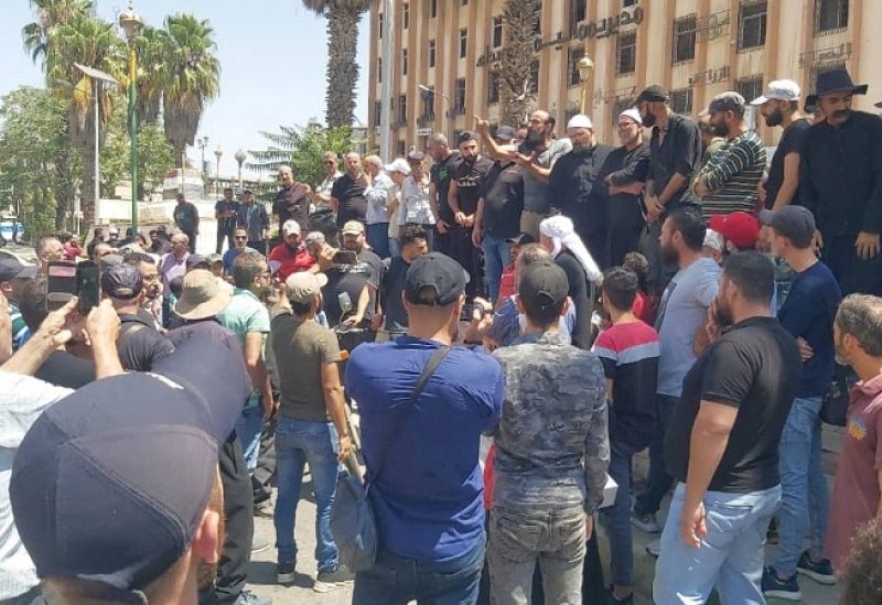 Demonstrators protest against the Syrian government decision on increasing the prices of fuels in Sweida, Syria, August 17,2023. Sweida 24/Handout via REUTERS THIS IMAGE HAS BEEN SUPPLIED BY A THIRD PARTY. NO RESALES. NO ARCHIVES. MANDATORY CREDIT