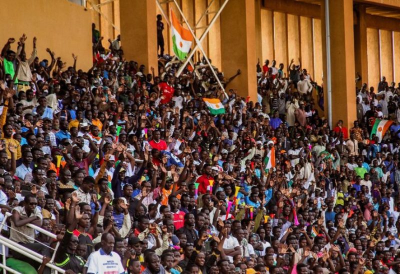 Supporters of Niger's coup leaders take part in a rally at a stadium in Niamey, Niger, August 6, 2023. REUTERS